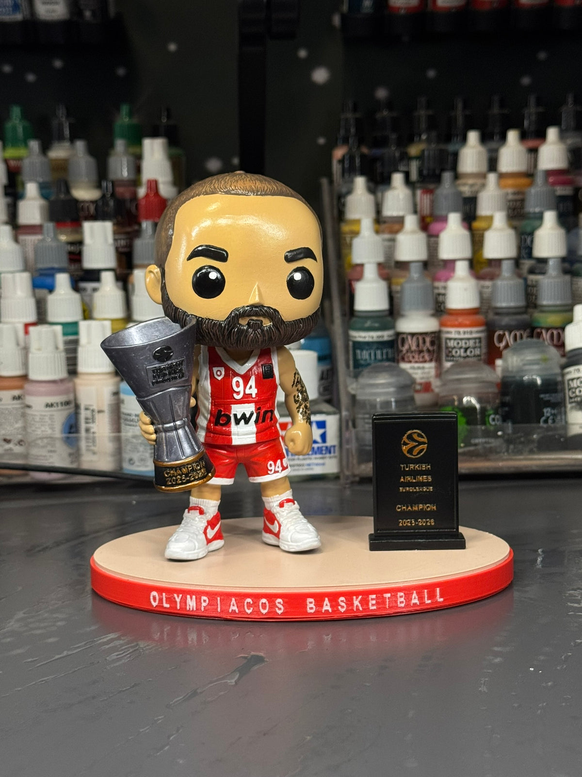 Evan Fournier hand-painted 15 cm basketball collectible figure, front view with trophy and display base