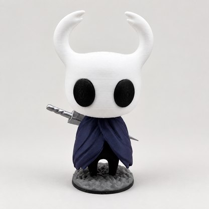 Hollow Knight 3D printed figure with nail and rocky base on a neutral studio background